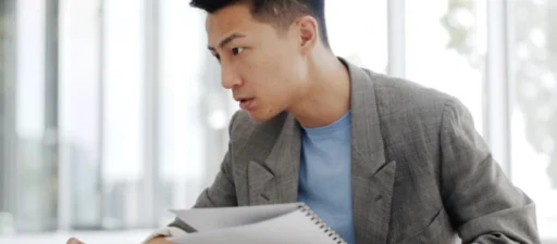 Claims Consultant reviewing reports